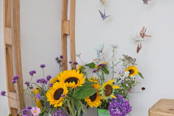 Yellow sunflowers and paper cranes wedding decoration