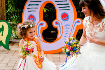 Bride and flower girl with flowers