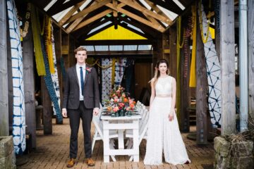 Bride and Groom at rustic wedding venue in Cornwall